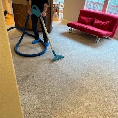 Carpet extraction wand pulling water out of wet carpet in a Gresham, OR home